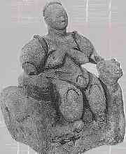 Moedergodin van het Anatolische atal Hyk, uit ca. -5800. Godin op een zetel, geflankeerd door twee leeuwinnen